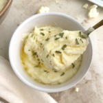 Mashed cauliflower in a white bowl