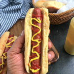 keto hot dog buns in a hand