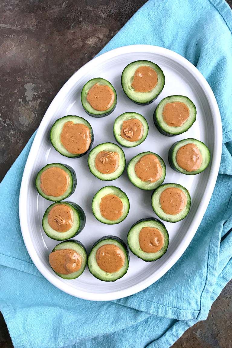 Top view of cucumber bites with peanut butter filling