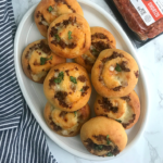 Keto pizza rolls in a white over plate